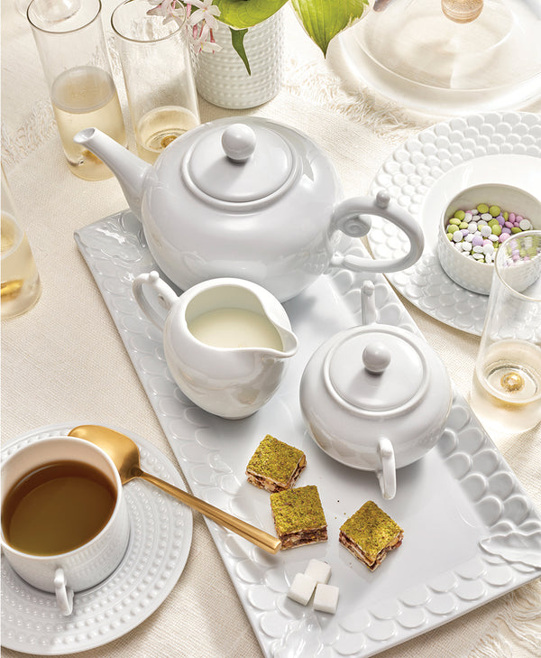 White Aegean Dinner and Coffee Sets on White Linens