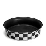 Damier Bowl - Large. Black and white checkerboard glaze pattern on a low, round porcelain bowl with a flared rim shape. Black glazed interior.