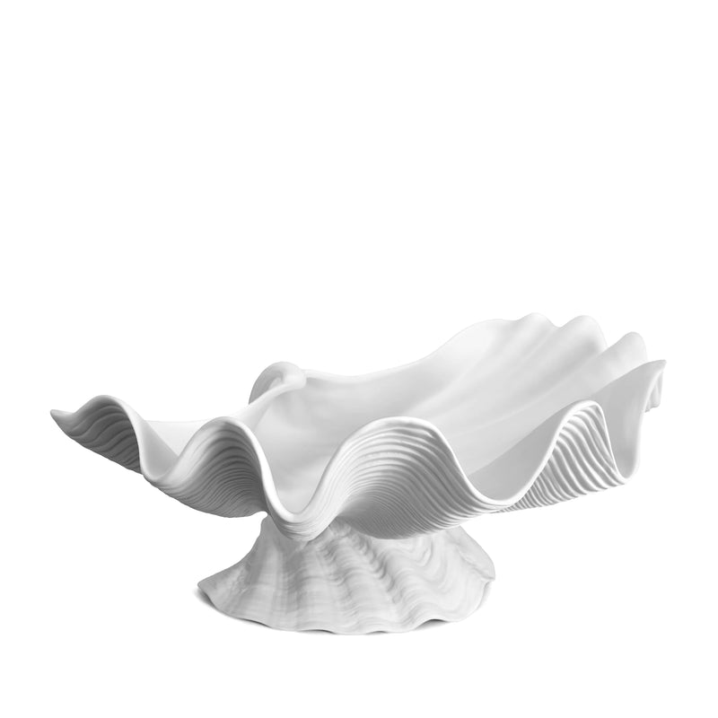 Neptune Bowl - X-Large. White porcelain shell-shaped bowl floating on a base. 