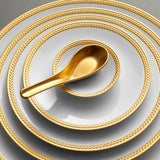 Gold Soie Tresse dinnerware with Chinese Spoon