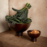 Alhambra medium and large bowls and hand-carved from fine smoked ash with brass details.