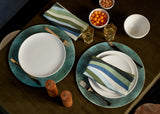 Table set with blue green landscape pattern napkins, Green round placemats, stone glazed terra dinnerware