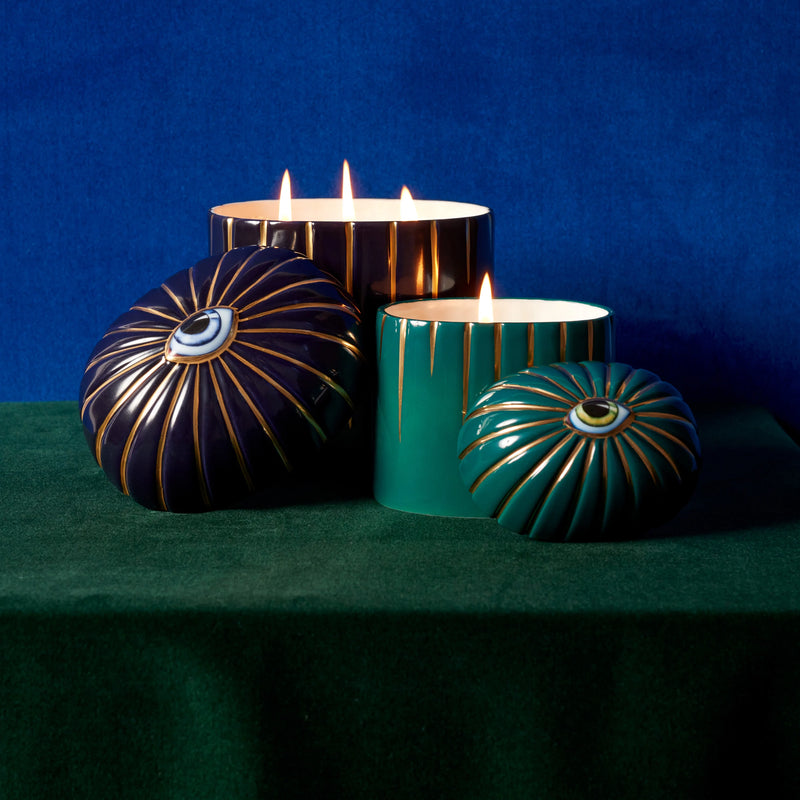 blue and green  Lito candles posed together and styled with moody blue and green backgrounds